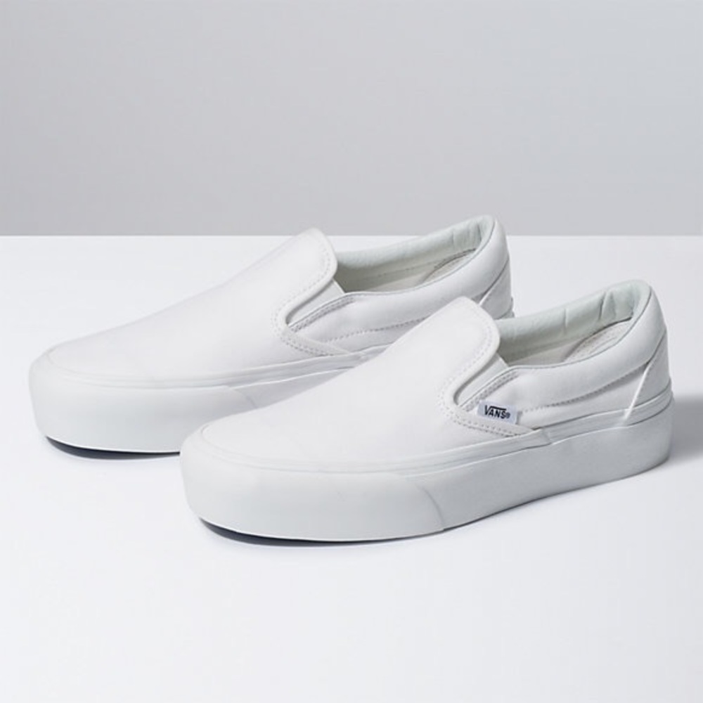 Vans White slip on